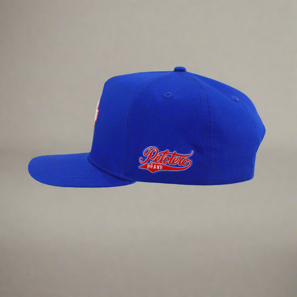 Blue cap with 'Petotero Brand' logo on a white background