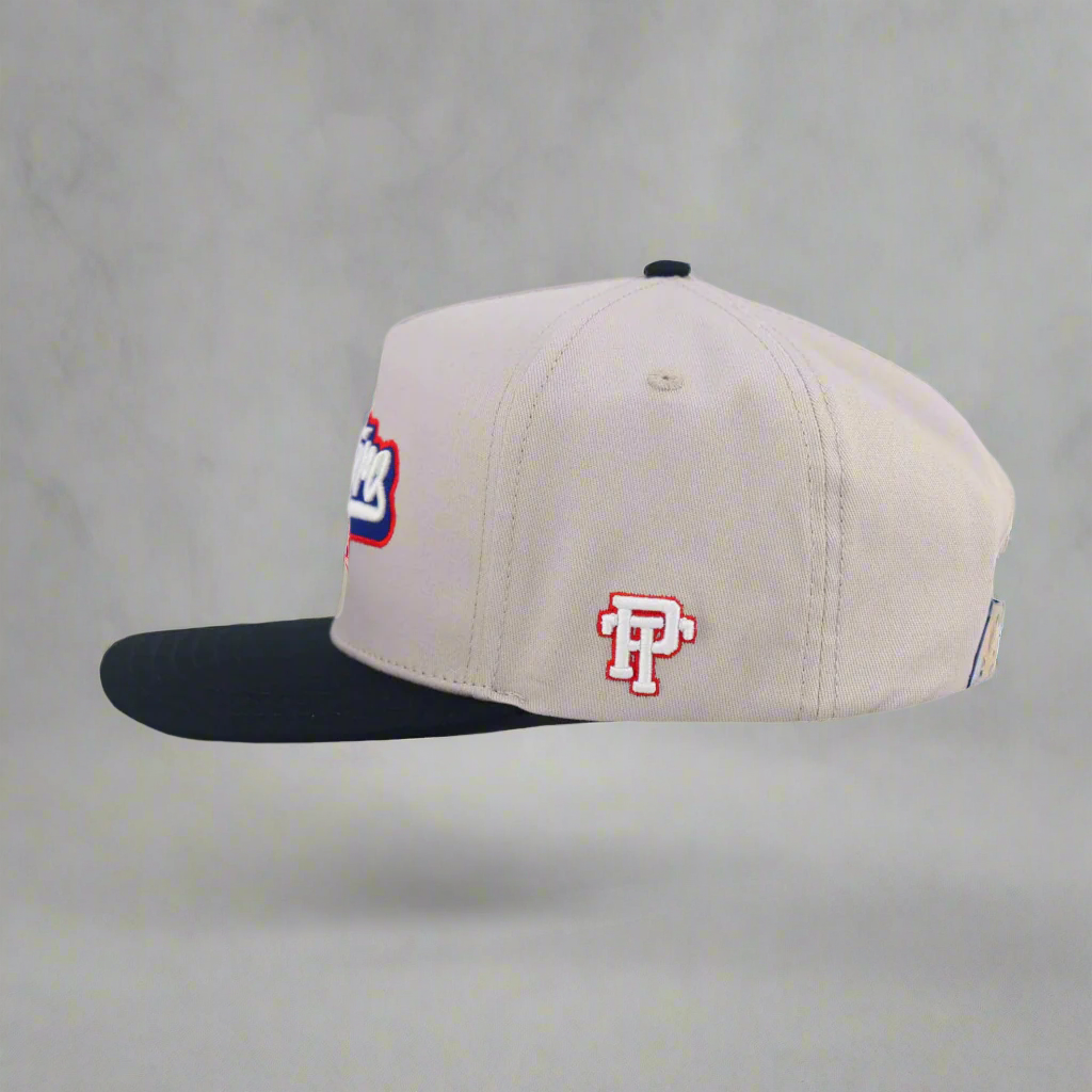 Two-tone cap with logos on a white background