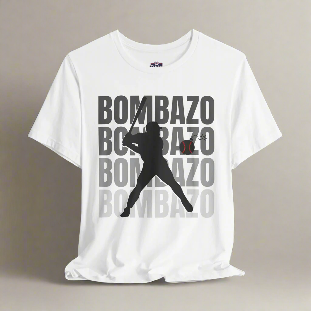 White t-shirt with black silhouette of a baseball player and 'BOMBAZO' text on a gray background