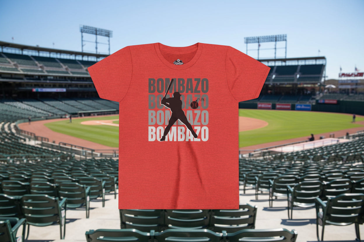 Red t-shirt with a graphic of a baseball player and the word 'BOMBAZO' printed multiple times on a white background.