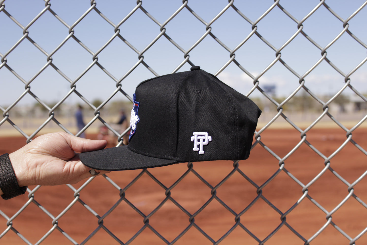 Pelotero Brand Logo Snapback - Black With Blue Bottom Brim
