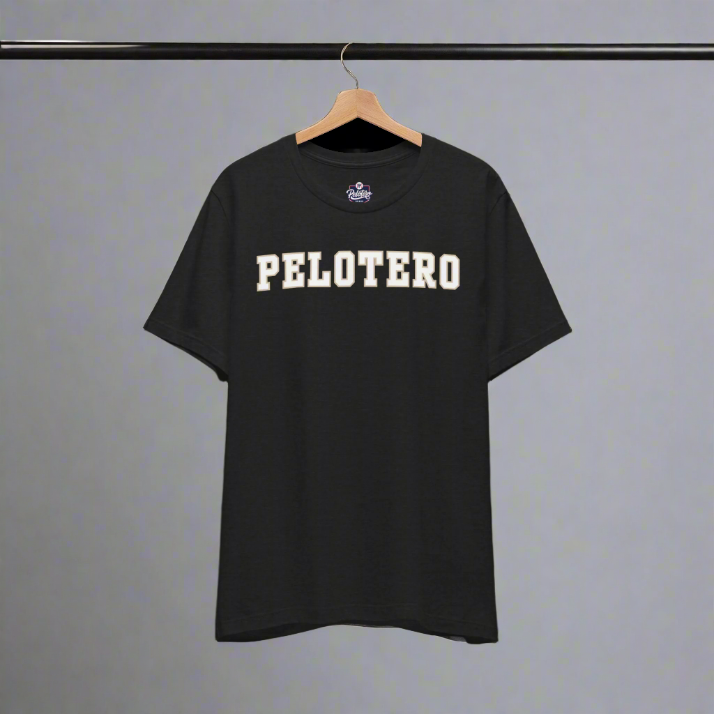 Black t-shirt with 'PELOTERO' text on a hanger against a white background